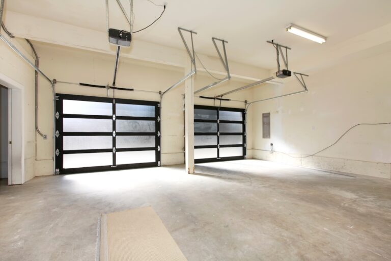 Modern two cars garage with glass doors.