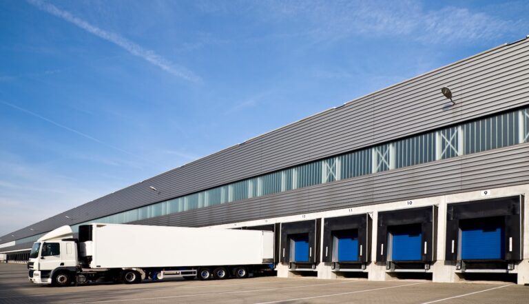 large semi in front of loading docks