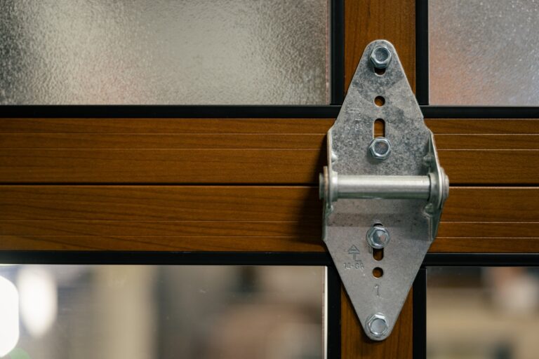 Garage door hinge