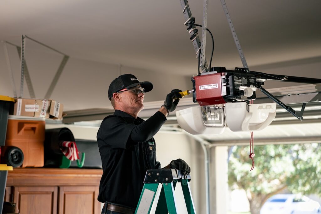 cedar park worker fixing opener